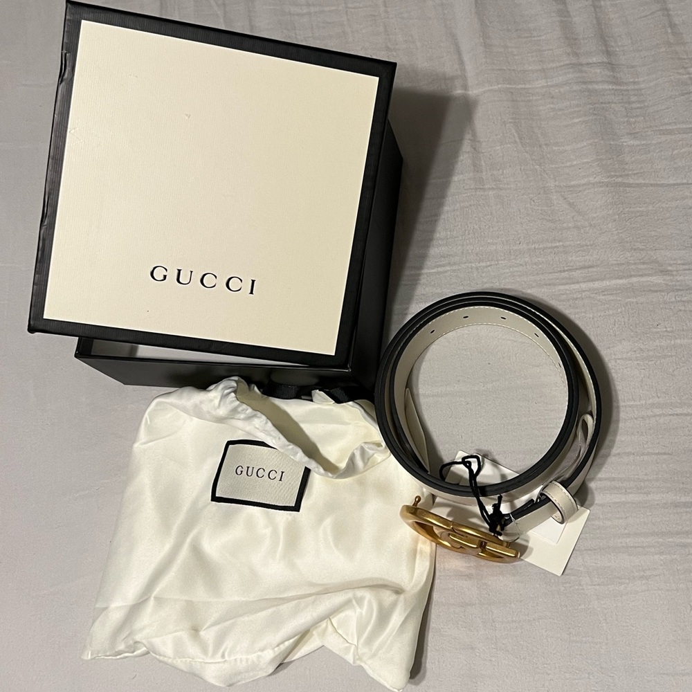 White and gold Gucci Belt